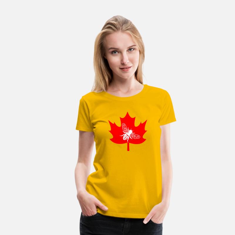 White honey bee in maple leaf logo
