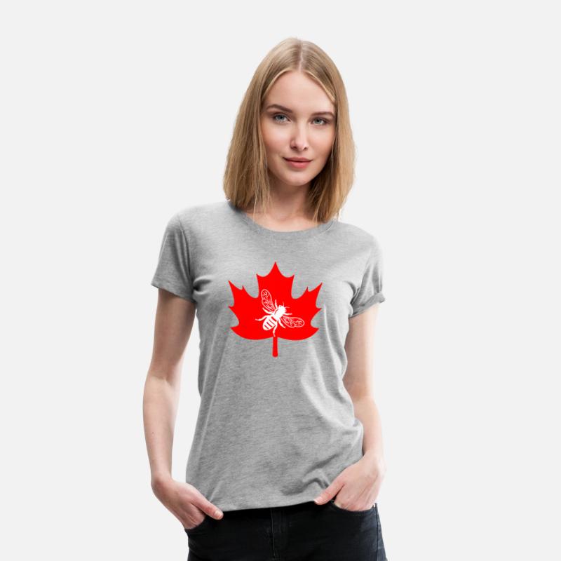 White honey bee in maple leaf logo